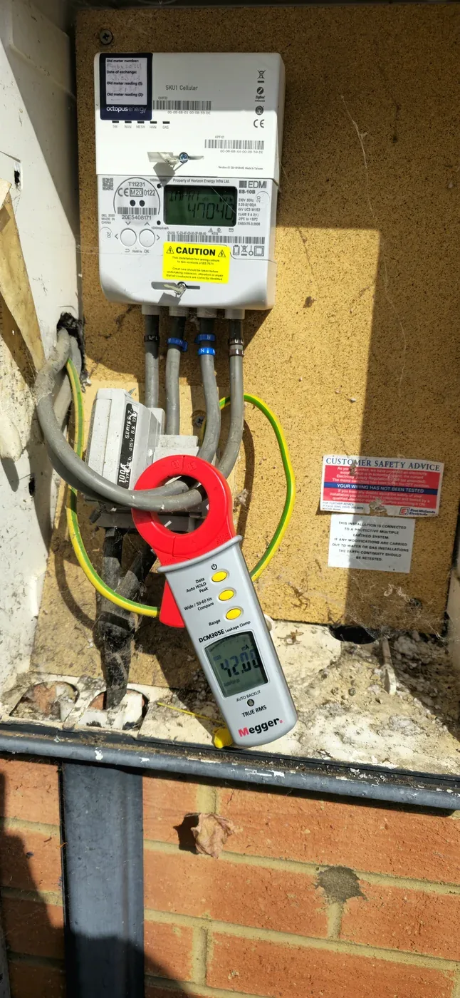 Electrical load testing at a smart meter using a Megger clamp meter