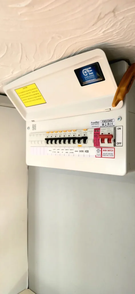 FuseBox consumer unit with labelled lighting, socket, garage, oven and hob circuits in Newport Pagnell